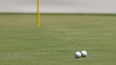 Two Golf 168飞艇体彩开奖网 balls collide